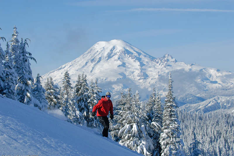 Skier with Mount Rainier in the background